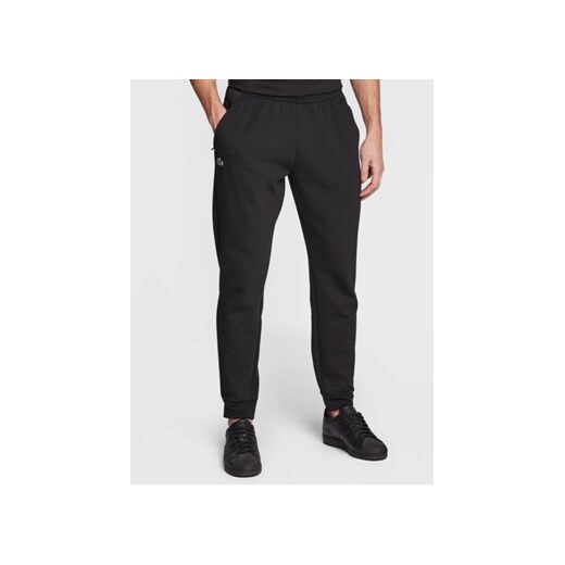 Lacoste Spodnie dresowe XH9559 Czarny Regular Fit ze sklepu MODIVO w kategorii Spodnie męskie - zdjęcie 170270143