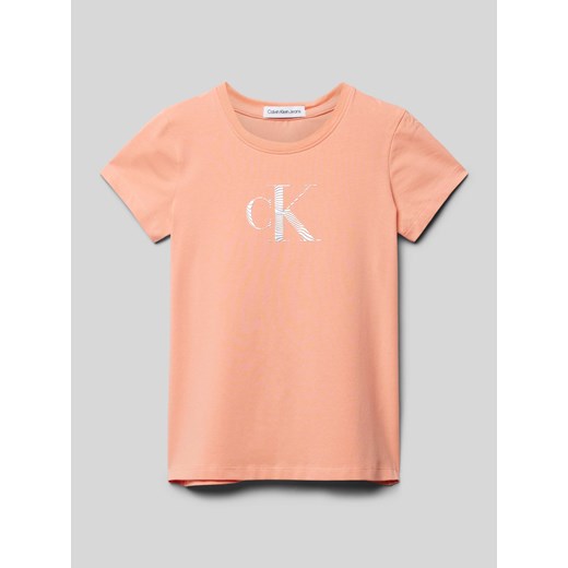 Bluzka dziewczęca pomarańczowy Calvin Klein z krótkim rękawem w nadruki bawełniana 