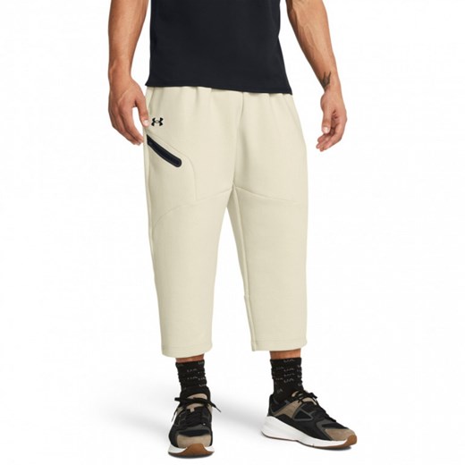 Męskie spodnie treningowe Under Armour Unstoppable Flc Baggy Crop - kremowe ze sklepu Sportstylestory.com w kategorii Spodnie męskie - zdjęcie 170280141