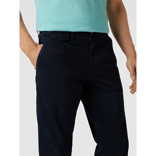 Spodnie z zakładkami w pasie model ‘CHELSEA’ Tommy Hilfiger 32/32 Peek&Cloppenburg  promocja