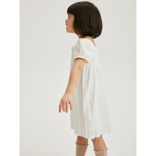 Reserved - Bawełniana sukienka - złamana biel Reserved 104 (3-4 lata) Reserved