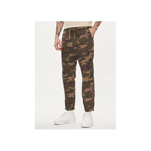 Gap Joggery 496157-00 Zielony Slim Fit ze sklepu MODIVO w kategorii Spodnie męskie - zdjęcie 170507520