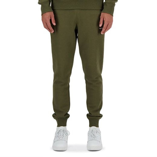 Spodnie dresowe New Balance MP03904DMO - zielone ze sklepu streetstyle24.pl w kategorii Spodnie męskie - zdjęcie 170514794