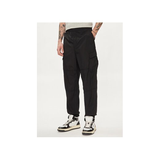 Gap Spodnie materiałowe 487058-00 Czarny Relaxed Fit ze sklepu MODIVO w kategorii Spodnie męskie - zdjęcie 170525770