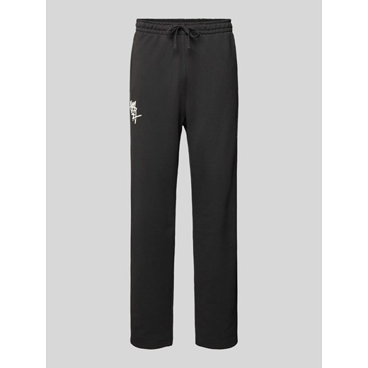 Spodnie dresowe z elastycznym ściągaczem ze sklepu Peek&Cloppenburg  w kategorii Spodnie męskie - zdjęcie 170535220