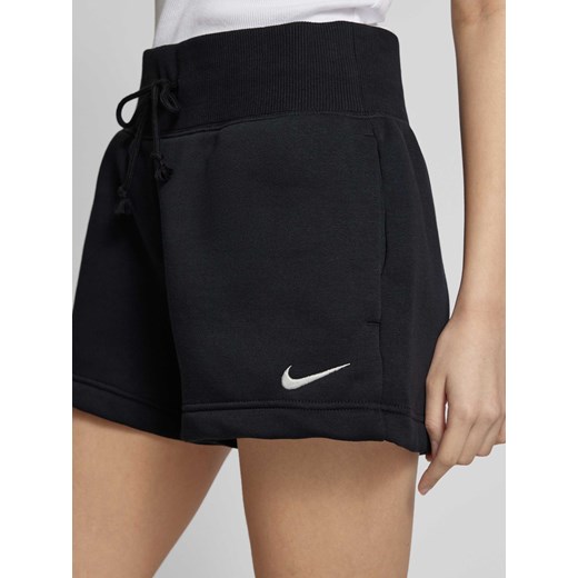 Szorty w jednolitym kolorze z wyhaftowanym logo Nike XS Peek&Cloppenburg 