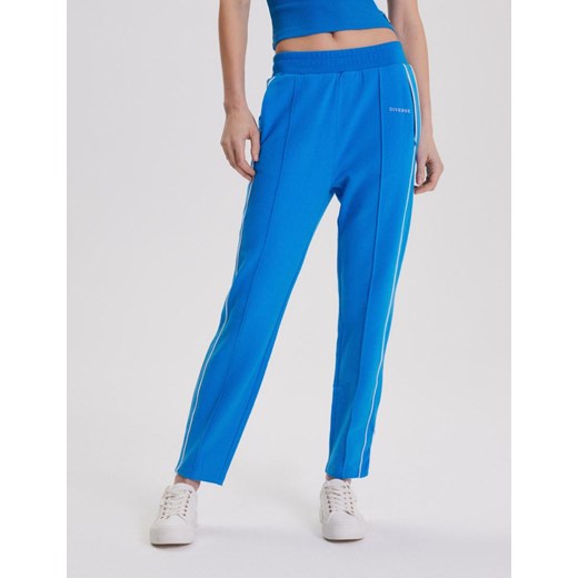 Spodnie dresowe RIVIER Niebieski XS ze sklepu Diverse w kategorii Spodnie damskie - zdjęcie 170552520