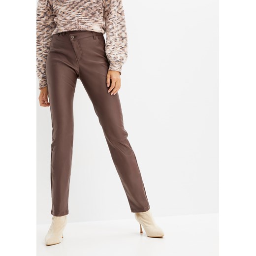 Spodnie ze sztucznej skóry, z ukośnym paskiem ze sklepu bonprix w kategorii Spodnie damskie - zdjęcie 170605432
