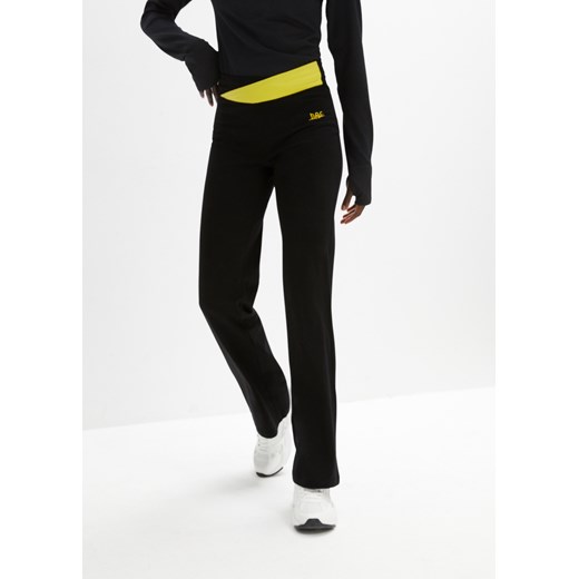 Spodnie sportowe ze stretchem, poszerzane nogawki ze sklepu bonprix w kategorii Spodnie damskie - zdjęcie 170609364