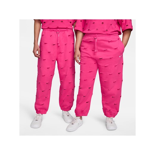 Spodnie Swoosh Nike x Jacquemus - Różowy ze sklepu Nike poland w kategorii Spodnie damskie - zdjęcie 170635244