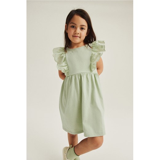 H & M - Dżersejowa sukienka z falbanami - Zielony ze sklepu H&M w kategorii Sukienki dziewczęce - zdjęcie 170636441