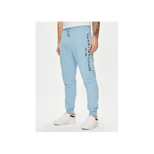 Tommy Hilfiger Spodnie dresowe Logo MW0MW08388 Niebieski Regular Fit ze sklepu MODIVO w kategorii Spodnie męskie - zdjęcie 170640392