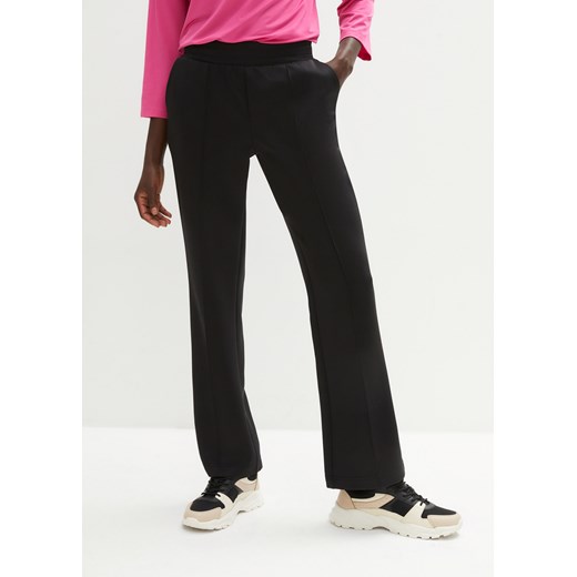Spodnie sportowe z szerokimi nogawkami, szybko schnące ze sklepu bonprix w kategorii Spodnie damskie - zdjęcie 170649283