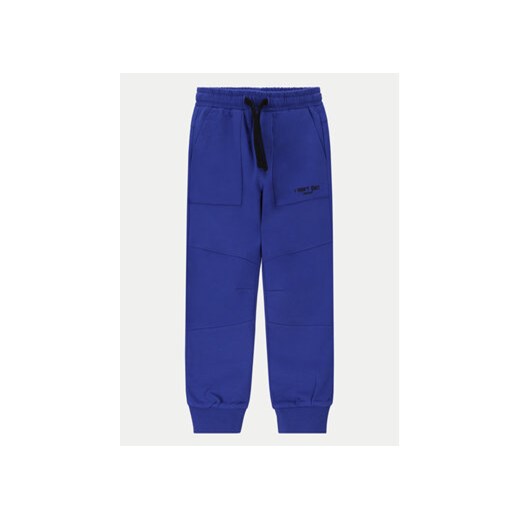 Coccodrillo Spodnie dresowe WC4120103GBK Niebieski Slim Fit ze sklepu MODIVO w kategorii Spodnie chłopięce - zdjęcie 170659673