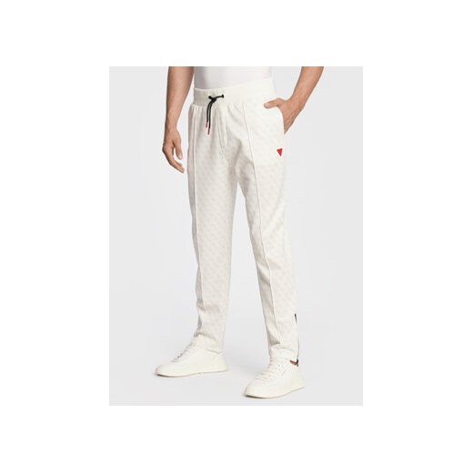 Guess Spodnie dresowe Korbin Z2BB05 FL04Q Écru Regular Fit ze sklepu MODIVO w kategorii Spodnie męskie - zdjęcie 170712844