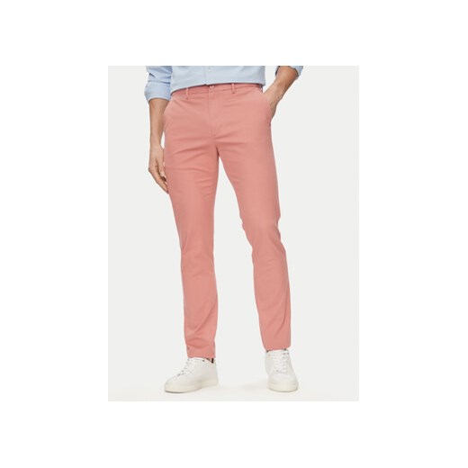 Tommy Hilfiger Chinosy Bleecker MW0MW26619 Różowy Slim Fit ze sklepu MODIVO w kategorii Spodnie męskie - zdjęcie 170726523