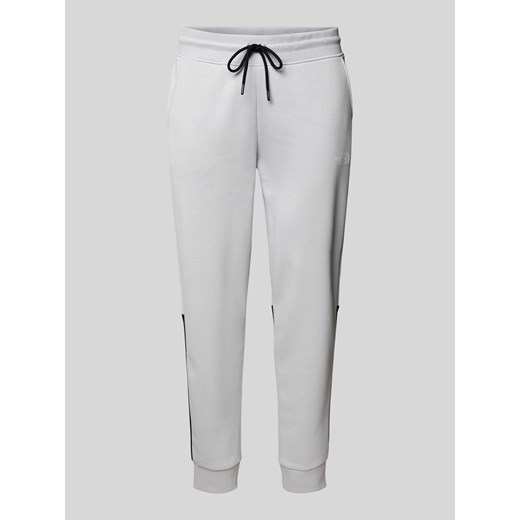 Spodnie dresowe o kroju regular fit z nadrukiem z logo model ‘ICONS’ ze sklepu Peek&Cloppenburg  w kategorii Spodnie męskie - zdjęcie 170772283