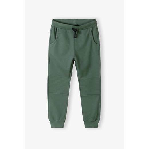 Bawełniane spodnie dresowe regular fit dla chłopca - khaki ze sklepu 5.10.15 w kategorii Spodnie chłopięce - zdjęcie 170772654