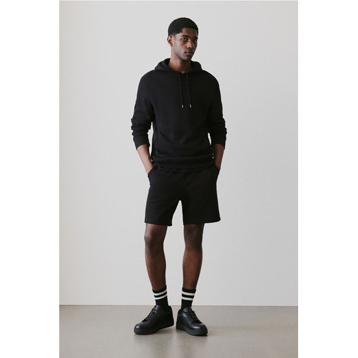 H & M - Szorty dresowe Regular Fit - Czarny ze sklepu H&M w kategorii Spodenki męskie - zdjęcie 170781880