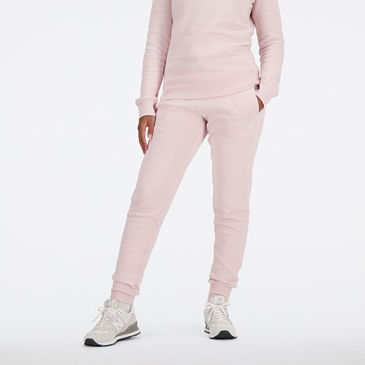 Spodnie damskie New Balance WP03805SOI – różowe ze sklepu New Balance Poland w kategorii Spodnie damskie - zdjęcie 170828942