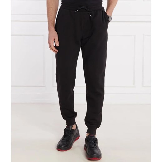 Tommy Hilfiger Spodnie dresowe FLAG LOGO | Relaxed fit ze sklepu Gomez Fashion Store w kategorii Spodnie męskie - zdjęcie 170852420