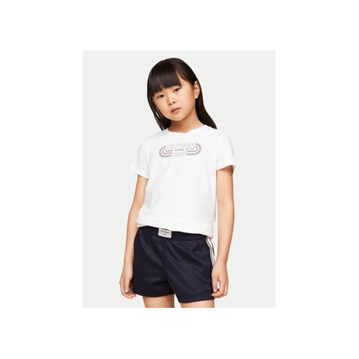 Tommy Hilfiger T-Shirt 1985 KG0KG07858 Biały Regular Fit ze sklepu MODIVO w kategorii Bluzki dziewczęce - zdjęcie 170878684