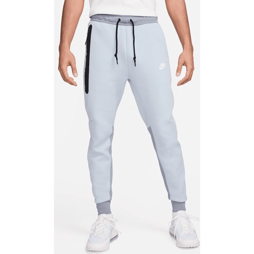 Joggery męskie Nike Sportswear Tech Fleece - Niebieski ze sklepu Nike poland w kategorii Spodnie męskie - zdjęcie 170914101