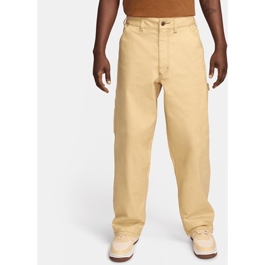 Męskie spodnie typu carpenter Nike Life - Brązowy ze sklepu Nike poland w kategorii Spodnie męskie - zdjęcie 170914214