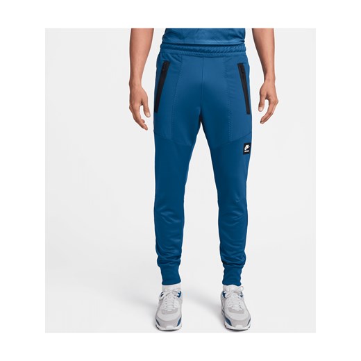 Niebieskie spodnie męskie Nike 