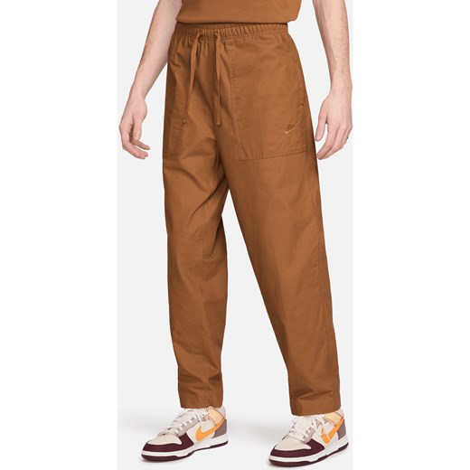 Spodnie męskie Nike Club - Brązowy ze sklepu Nike poland w kategorii Spodnie męskie - zdjęcie 170914653