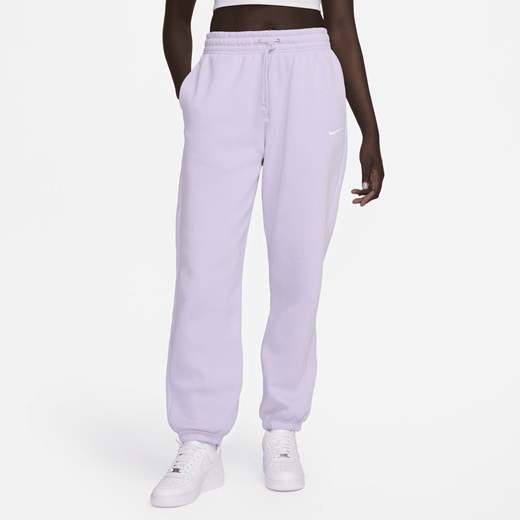 Fioletowe spodnie damskie Nike na wiosnę 