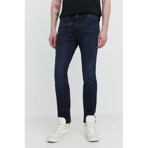 HUGO jeansy męskie kolor granatowy 50511351 ze sklepu ANSWEAR.com w kategorii Jeansy męskie - zdjęcie 170938320