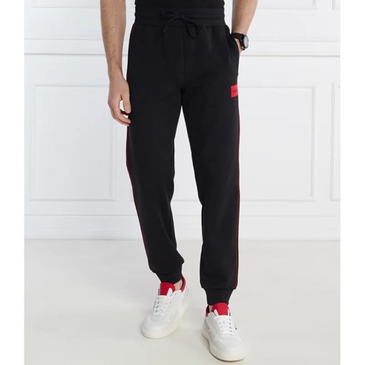 Hugo Bodywear Spodnie dresowe Badge Pants | Relaxed fit ze sklepu Gomez Fashion Store w kategorii Spodnie męskie - zdjęcie 170939383