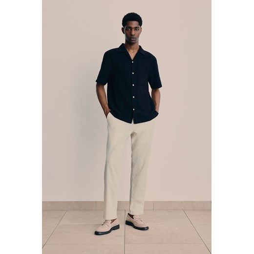 H & M - Spodnie z domieszką lnu Regular Fit - Biały ze sklepu H&M w kategorii Spodnie męskie - zdjęcie 170948640