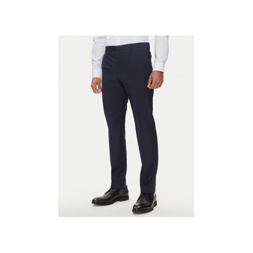 Calvin Klein Spodnie materiałowe K10K112936 Granatowy Slim Fit ze sklepu MODIVO w kategorii Spodnie męskie - zdjęcie 170968733