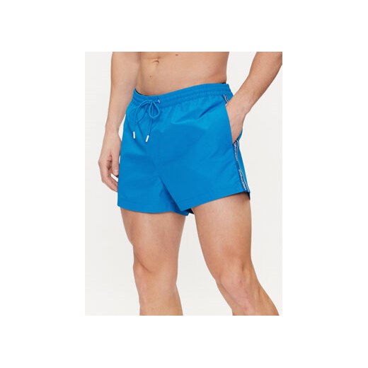 Calvin Klein Swimwear Szorty kąpielowe KM0KM00956 Niebieski Regular Fit ze sklepu MODIVO w kategorii Kąpielówki - zdjęcie 170970810