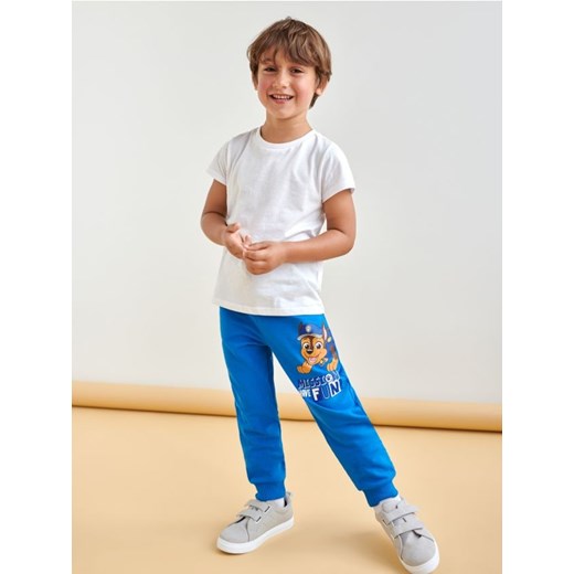Sinsay - Spodnie dresowe jogger Psi Patrol - niebieski ze sklepu Sinsay w kategorii Spodnie chłopięce - zdjęcie 170977801