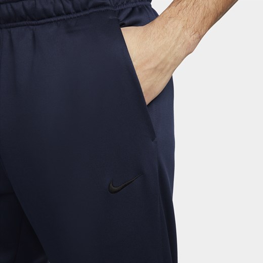 Męskie zwężane spodnie do fitnessu Therma-FIT Nike Therma - Niebieski Nike M Nike poland