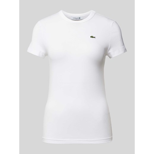 T-shirt o kroju slim fit z detalem z logo ze sklepu Peek&Cloppenburg  w kategorii Bluzki damskie - zdjęcie 171149490