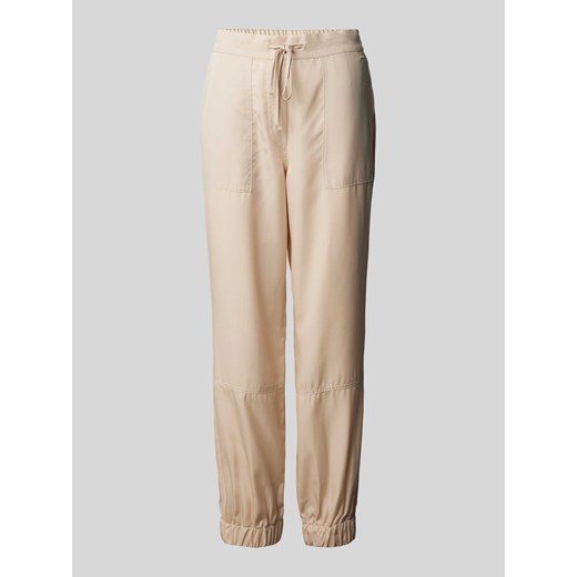 Spodnie materiałowe o kroju tapered fit z wiązanym paskiem ze sklepu Peek&Cloppenburg  w kategorii Spodnie damskie - zdjęcie 171154184