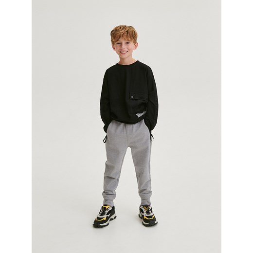 Reserved - Dresowe joggery z zamkami - ciemnoszary ze sklepu Reserved w kategorii Spodnie chłopięce - zdjęcie 171184901
