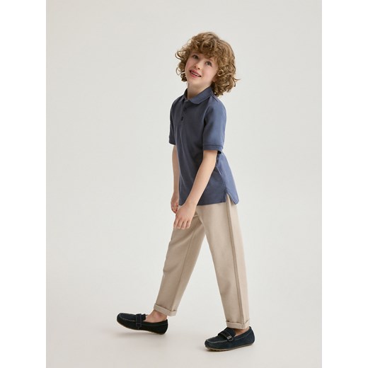 Reserved - Dzianinowe spodnie chino - beżowy ze sklepu Reserved w kategorii Spodnie chłopięce - zdjęcie 171185240