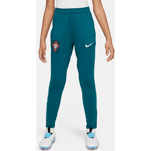 Dzianinowe spodnie piłkarskie dla dużych dzieci Nike Dri-FIT Portugalia Strike - Zieleń ze sklepu Nike poland w kategorii Spodnie chłopięce - zdjęcie 171206723