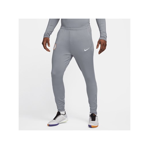 Męskie spodnie piłkarskie z dzianiny Nike Dri-FIT Nigeria Strike - Szary ze sklepu Nike poland w kategorii Spodnie męskie - zdjęcie 171206752