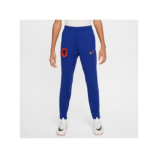 Dzianinowe spodnie piłkarskie dla dużych dzieci Nike Dri-FIT Holandia Strike - Niebieski ze sklepu Nike poland w kategorii Spodnie chłopięce - zdjęcie 171206781