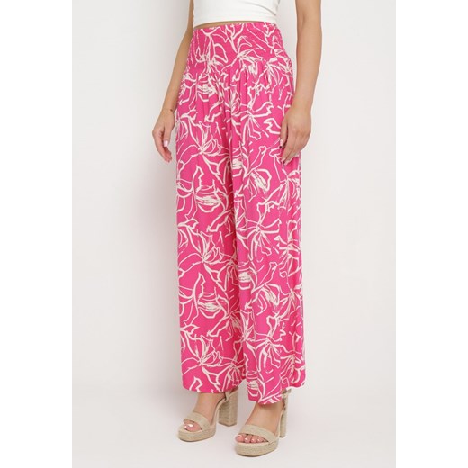 Różowe Wiskozowe Spodnie Szerokie we Florystyczny Wzór Seridwen ze sklepu Born2be Odzież w kategorii Spodnie damskie - zdjęcie 171224413
