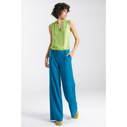 Nife Spodnie w kolorze niebieskim ze sklepu Limango Polska w kategorii Spodnie damskie - zdjęcie 171233534