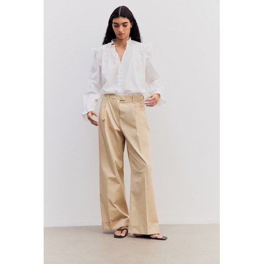 H & M - Spodnie chinos Loose Fit - Beżowy ze sklepu H&M w kategorii Spodnie damskie - zdjęcie 171246401