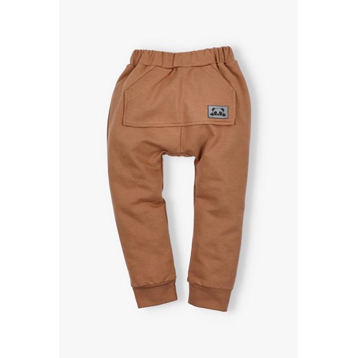 Spodnie chłopięce baggy brązowe ze sklepu 5.10.15 w kategorii Spodnie chłopięce - zdjęcie 171260671
