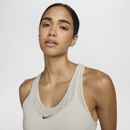 Damska wełniana koszulka bez rękawów do biegania Dri-FIT Nike Swift - Biel Nike S (EU 36-38) Nike poland